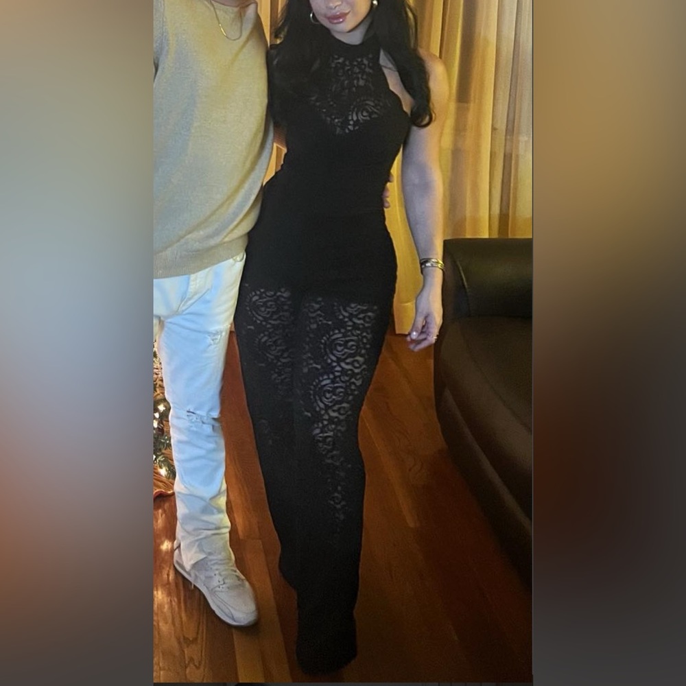 Black lace jumpsuit with halter neckline